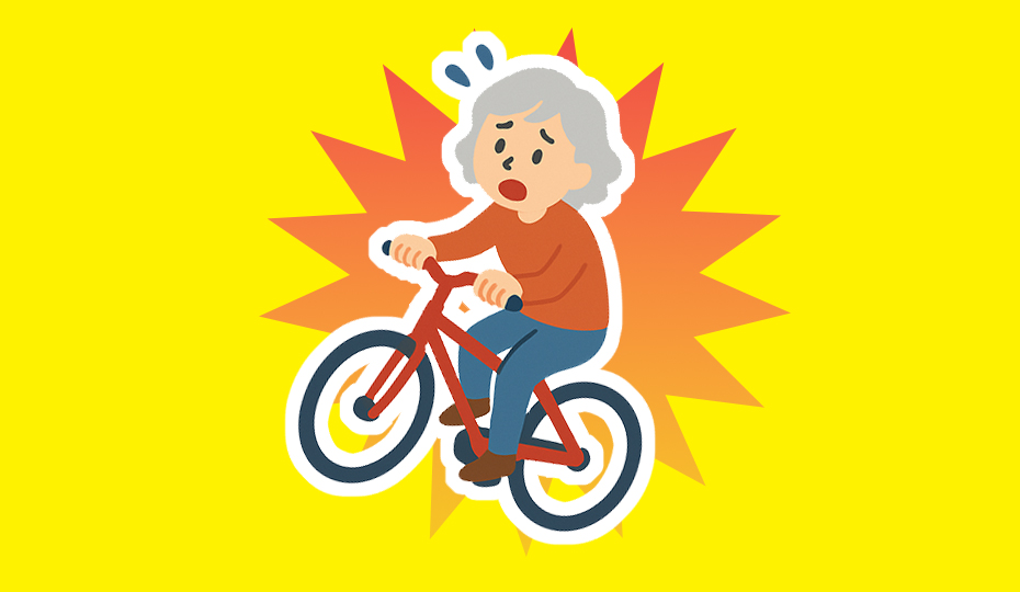 自転車で転倒する女性のイメージ