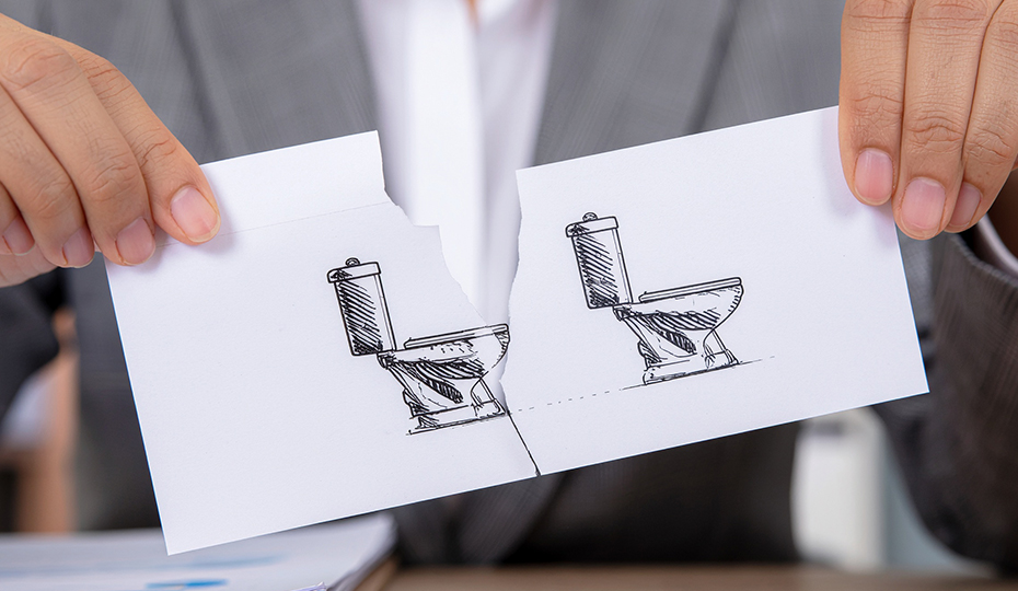 トイレのイラストを持つ人